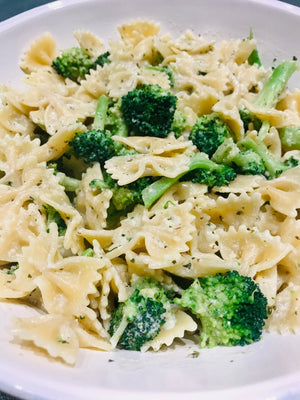 Spaghetti with broccoli and walnut-ricotta pesto