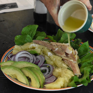 A Smoked Trout; avocado; and arugula salad for a hot summer dinner c